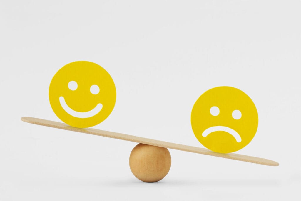 smiley face sad face scale concept sadness as predominant emotion